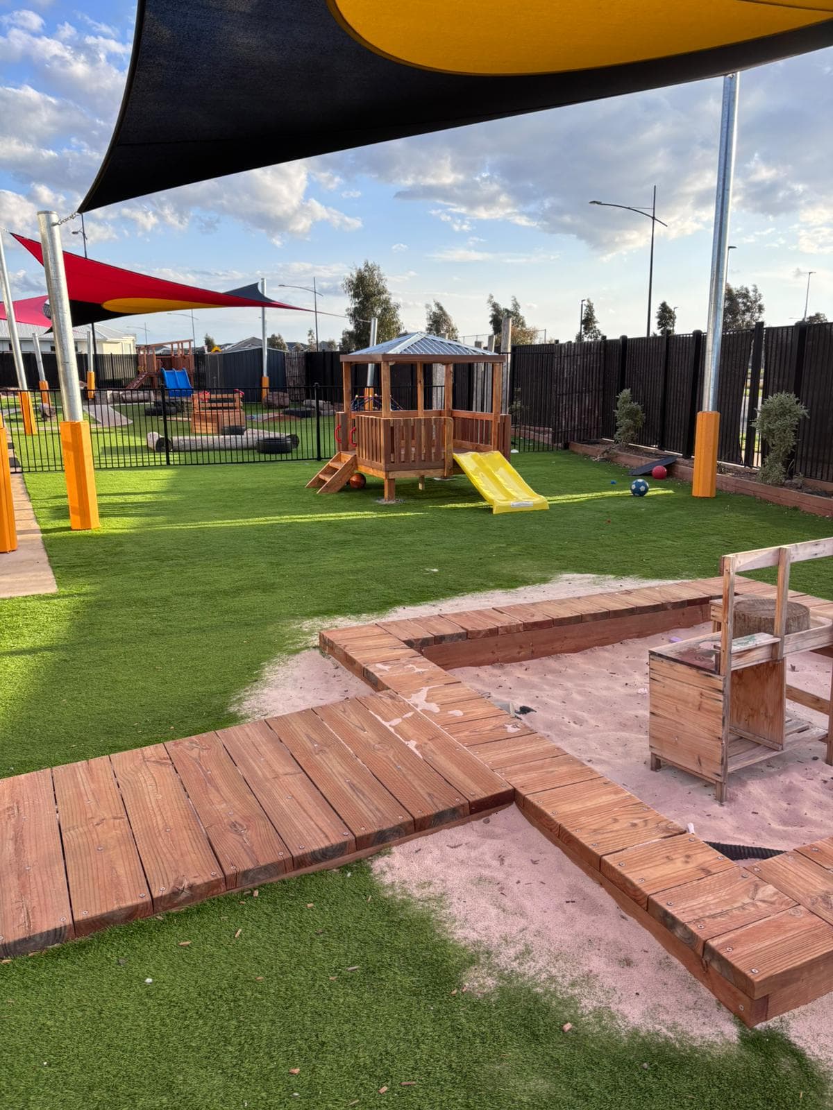 Timber boardwalk through outdoor construction site