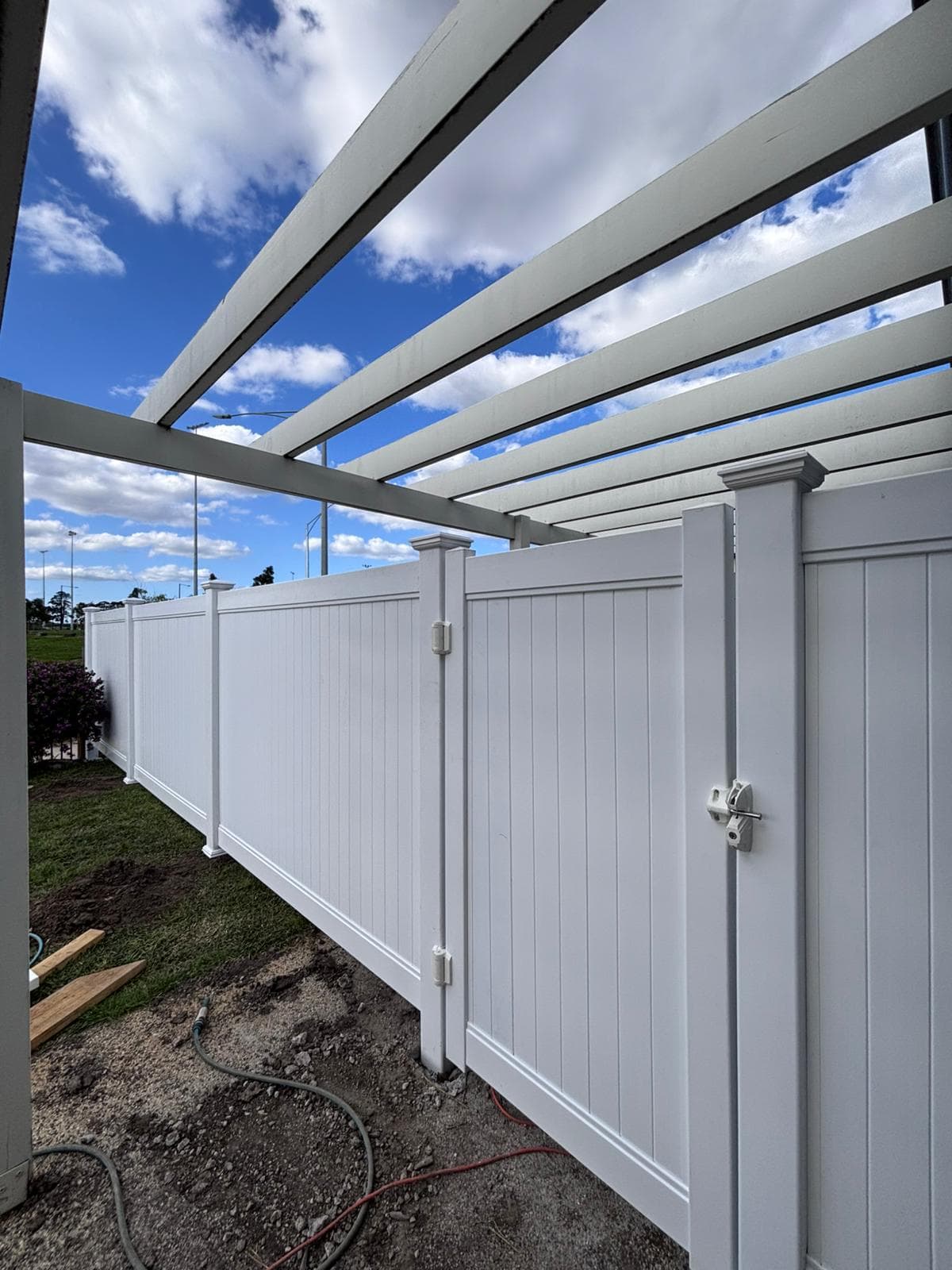 White fence and pergola detail